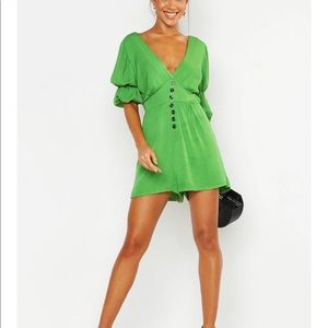 Puffy sleeved green romper. Loose fit. size 10